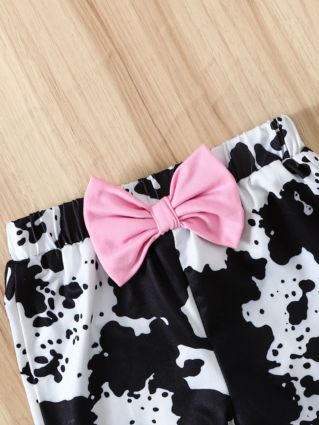 Baby Girl Pink Waffle Bodysuit & Cow Print Flare Pants Set
