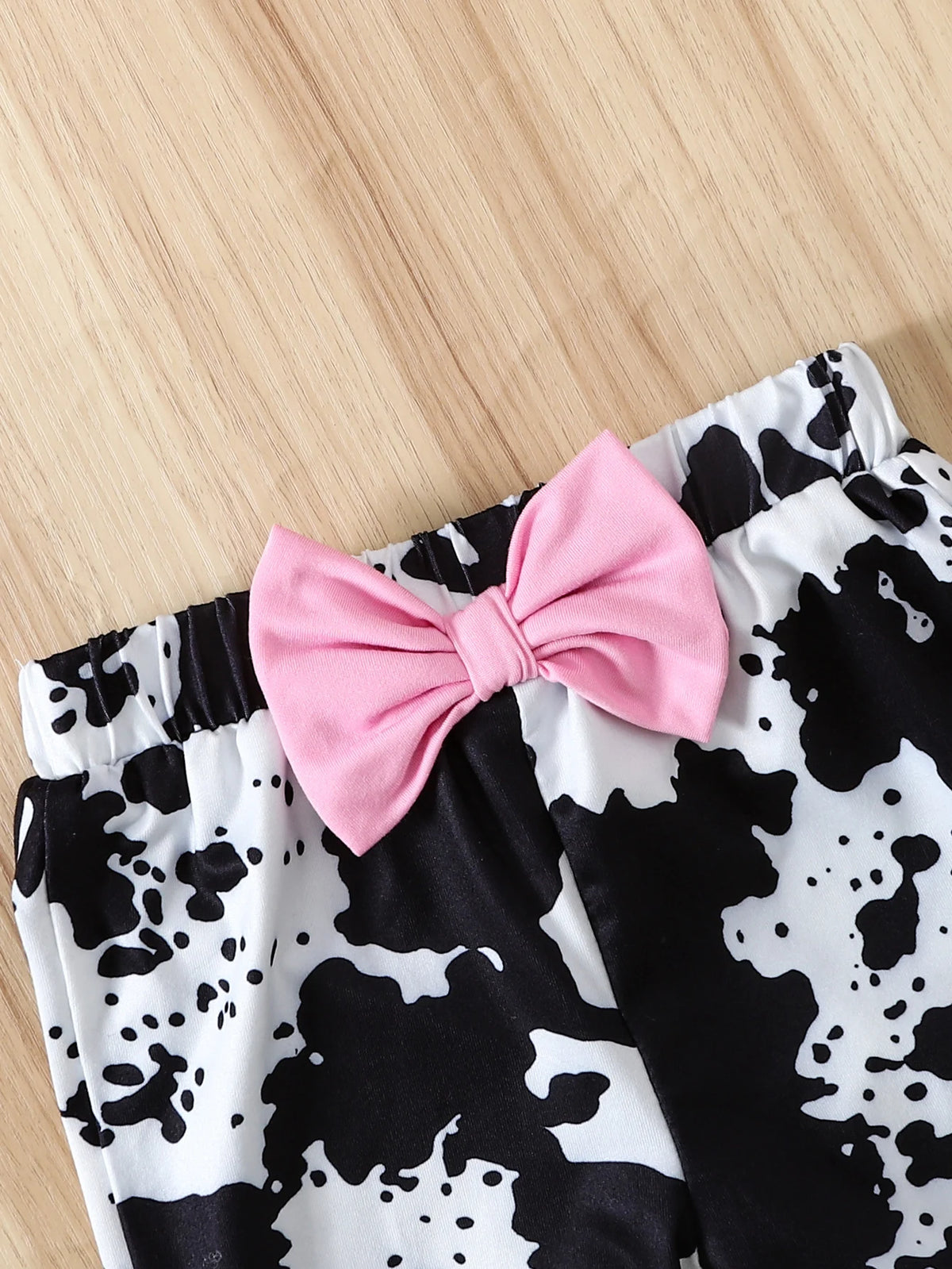 Baby Girl Pink Waffle Bodysuit & Cow Print Flare Pants Set