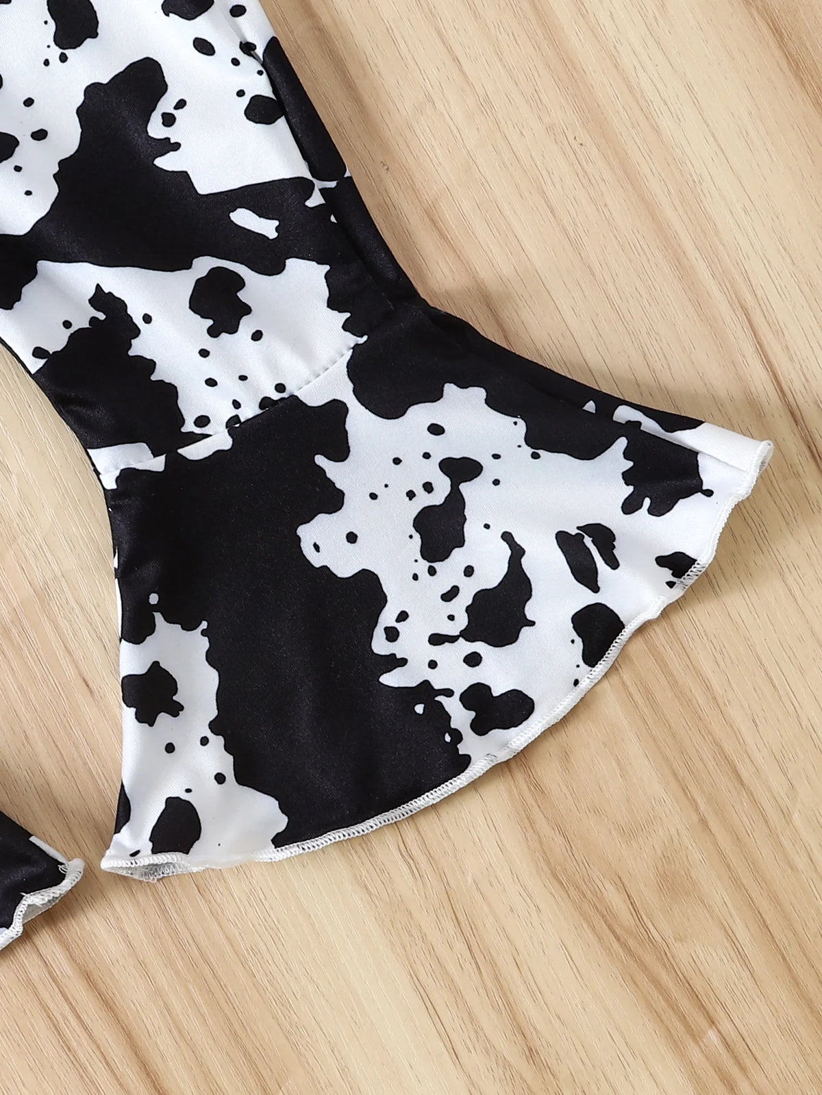 Baby Girl Pink Waffle Bodysuit & Cow Print Flare Pants Set